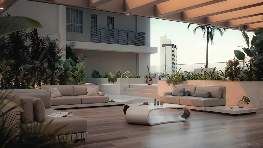 Lounge externo com sofás e paisagismo