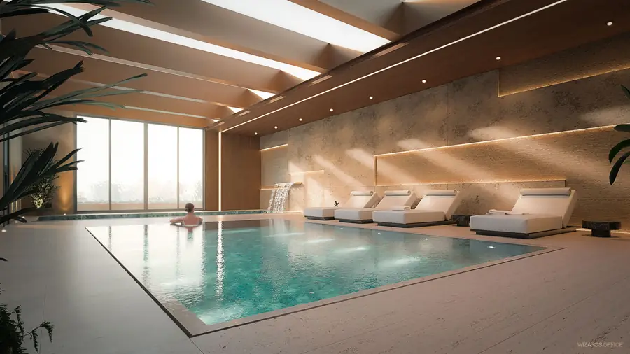 Piscina aquecida coberta com espreguiçadeiras